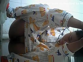 Asian peeing in pajama