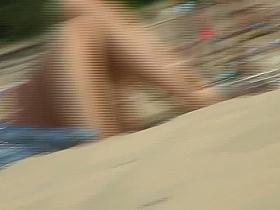Spying on naked teen pussy at nudist beach