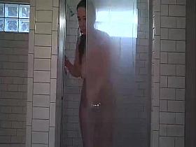 Wife shaving in shower