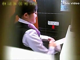 Asian co-workers spied in office toilet