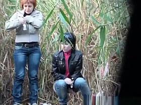 Chubby redhead and brunette chicks spied pissing