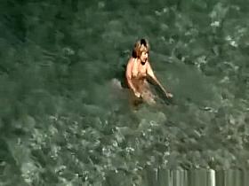 Mature nudist women in the water
