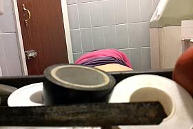 The ass of amateur spied while her pissing on toilet