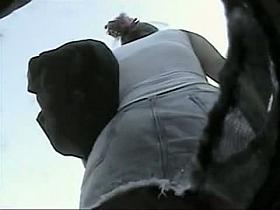 Fat babe's ass is filmed on the voyeur camera this noon