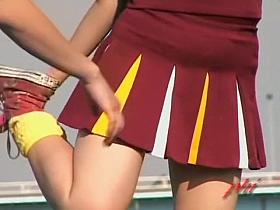 Voyeur watches Japanese cheerleaders strip in public
