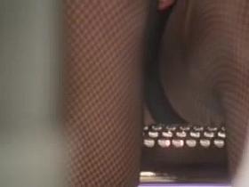 Fishnet stockings legs stretched widely up the skirt AB00