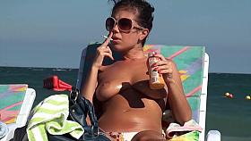 Voyeur Films Busty Brunette Girl At The Beach