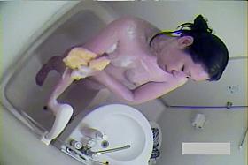 Sexy Asian brunette taking a long, hot bath caught on bath hidden cam