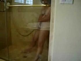 Spying my cute mom fingering in shower. Hidden cam