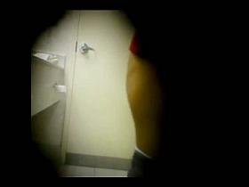 Hidden camera man filming pissing girls in bathroom