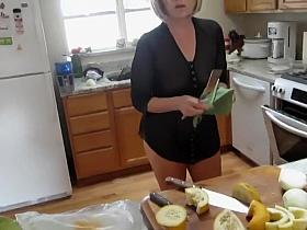 Mature lady spied while baking muffins