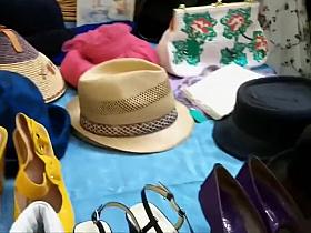 Big busty lady spied while selling hats