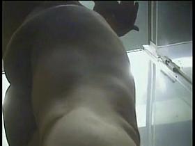 Spy cam in dressing room catches nude tits and bush on pussy