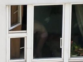 A teen is filmed by a voyeur neighbor