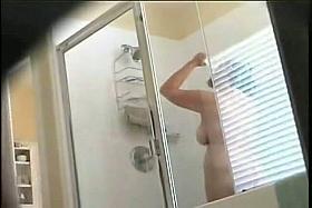 Hidden shower cam gets fat mature chick showering