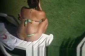 Mature woman spyied by the pool