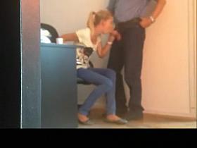Blonde blows boss cock in the office