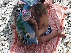 Touch cock at the beach
