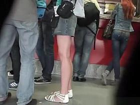 UpBlonde chick in short jeans skirt upskirt